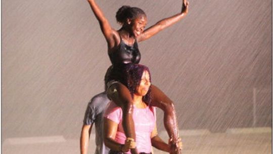 Zari Thompson (top) and Kimora Burks enjoy a cool end to summer band and guard camp.