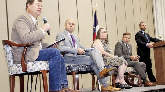 Panelists (from left) Gary Westbrook, Tom Oney, Liz Jones and Will McAdams discuss water and electricity resources for Williamson County. Photo by Jason Hennington