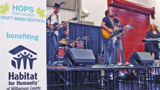 The band Bottlecap Mountain was one of several featured acts at the Hops for Houses Craft Beer Festival in Taylor Feb. 29, 2021. Photo by Fernando Castro