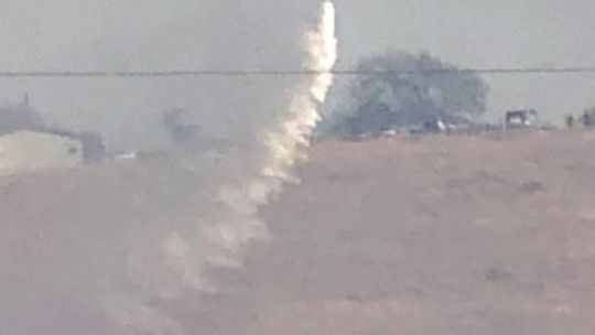 Travis County STAR Flight drops water on a brush fire in south Hutto Jan. 14. Photos by Lt. Mike Pendley