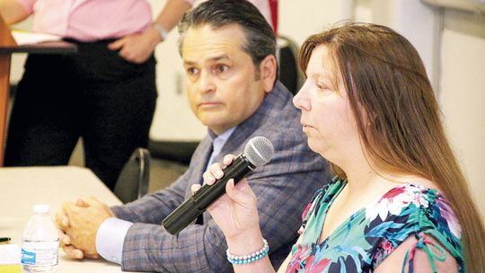 Taylor ISD at-large candidates Jim Buzan (left) and Lisa Baum answered questions during the candidate forum last week. TAYLOR ISD AT-LARGE