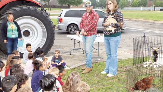 T. H. Johnson Elementary School hosted career day to help students explore future job opportunities. Community volunteers spent the morning teaching kindergarteners and first graders about farming, baking, engineering and bee keeping as well as careers in dental, medical, firefighting and...