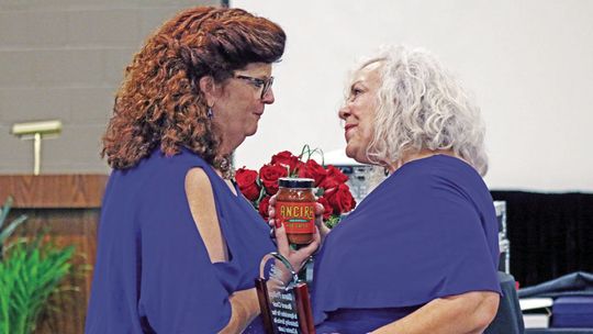 Chamber President Tia Stone (left) thanks outgoing chair Diana Phillips for her work on the Chamber Board of Directors. Photo by Jason Hennington