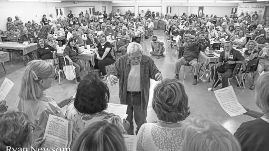 Former Taylor choir director William Kretzmeier reunites with his 1969-1970 students for a homecoming performance. Courtesy photos