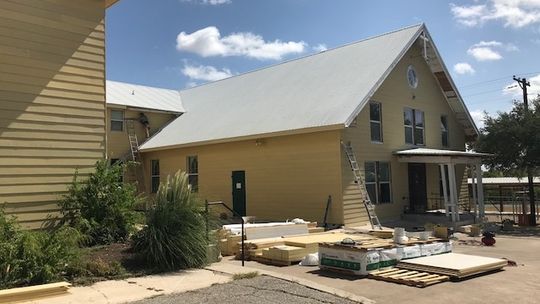 New siding going onto Coupland’s St. Peter’s Church.