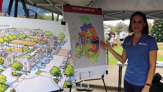 Caitlin Admire was part of the Freese &amp; Nichols team on hand to explain the plan to anyone with questions. There were also comment cards residents could fill out. Photo by Edie Zuvanich.