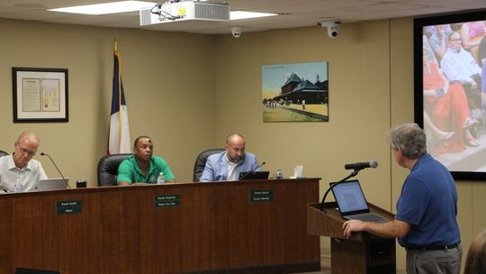 Citizen Michael Prillaman speaks against compensation increase to city council. The approved motion increased their stipends from $25 to $1,000 per month and to $1,500 per month for the mayor’s position. Photo by Hunter Dworaczyk