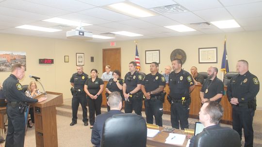 Members of the Taylor Police Department listen to Chief of Police Henry Fluck during a recognition at the City Council meeting in Taylor July 22, 2021. Photo by Fernando Castro