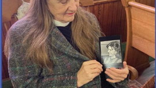 The Rev. Terry Pierce shows a picture of her sister Cynthia who died in an assisted living facility due to hypothermia during Winter Storm Uri. Photo by Nicole Lessin