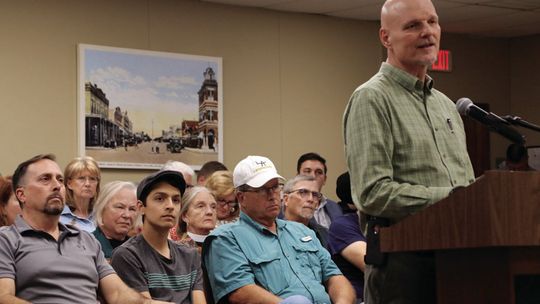 Pastor Jeff Ripple speaks in the Dec. 8 council meeting about an agenda item about a new policy for city co-sponsored events. Photo by Jason Hennington