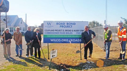 Officials celebrate the groundbreaking of a Coupland road project Feb. 7. Pictured are, from left, Aldermen Susan Garry and Karen Marosko, Mayor Jack Piper, Mayor Pro-Tem Barbara Piper, Commissioner Russ Boles, Chasco Construction’s Clint Goertz and CONSOR’s Zach Kenealy. Photos by Fernand...