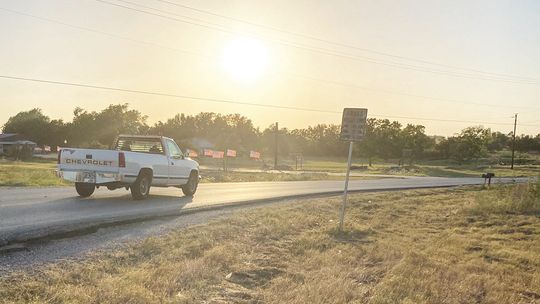 A truck drives along County Road 366 July 13 in Taylor. The road between Carlos G. Parker Boulevard and Chandler Road will close until June 2024 beginning next week. Photo by Nicole Lessin