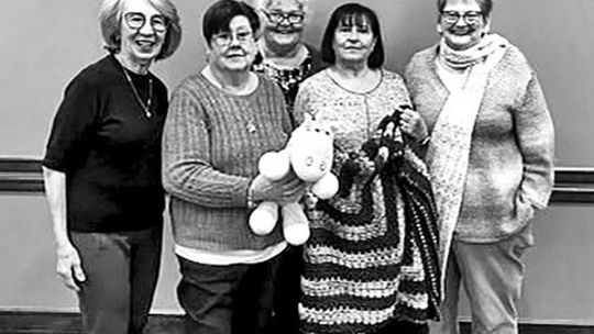 Library supporters gather Nov. 15 at the Taylor Public Library. (From left) Maria Newman, Shirley Eleanor, Robin McKinley, Lucy Cutrali, and Kitty Hume