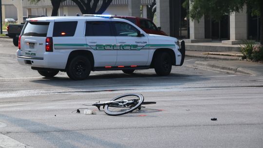 A cyclist was hit by a vehicle on Main Street early Monday morning.