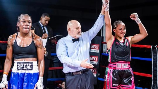 Victory is “Too Sweet” for Destiny Jones (right) as she is declared the winner after a fight against Clarice “Reese” Morales.