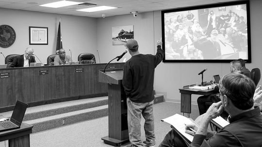 Brian Winkler speaks during a public hearing Feb. 23. Photo by Nicole Lessin