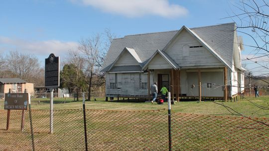 The Dickey Museum gets studied for its phase three construction phase by Pheonix 1 Restoration & Construction, which includes repairing windows and doors. Photo by TheresaChristine Etim