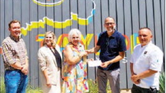 Dinner in the street feeds funds to local nonprofit