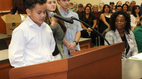 A. J. Sanchez, Lacey Thompson and Ben Bachmayer represent Taylor Middle School in expressing thanks to school board members for all they do to support students and learning.