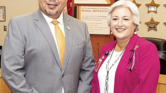 Raúl Peña (left) with outgoing superintendent Dr. Celina Estrada Thomas.