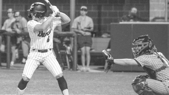 Ducks junior Devin Valdez standing in the batter’s box awaiting the pitch. Photo By Larry Pelchat