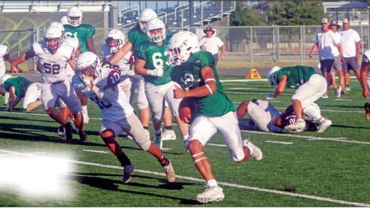 Ducks football scrimmages Cameron