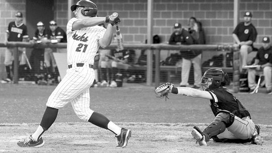 Braylan Alderete swinging hard and putting the ball into play for a base hit. Photo by Larry Pelchat