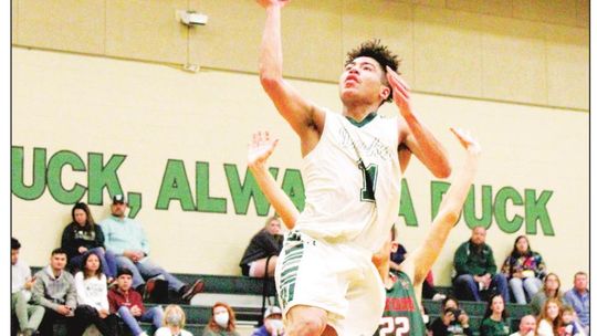 Shaivion Warren goes up for the layup against a Gateway defender Jan. 21. Photos by Matt Hooks