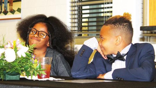 Audrey Griggs gets ready to receive her Junior Youth of the Year recognition while Kaishon Ford looks on during the B&amp;GC of East Williamson County annual banquet in Taylor March 31. Photo by Fernando Castro