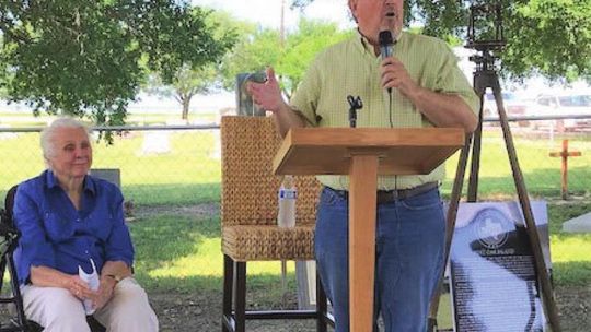 Charlene Hanson Jordan looks on as Trey Smith discusses the history of the area during a ceremony at Type Church near Coupland May 14. Photos by Susan Garry