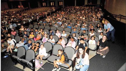 Main Street Elementary students and staff record a video that will be sent as a greeting to Capt. Stephen Bowen in space. Photo courtesy of Taylor ISD