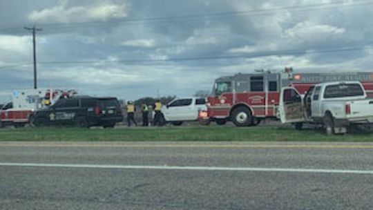 Firefighters and police officers clear the scene of a fatal accident on state Highway 79 near Limmer Loop in Frameswitch between Taylor and Hutto. Photo by Evan Hale