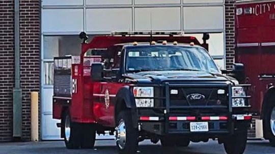 Fire truck stranded on railroad tracks heading to fire