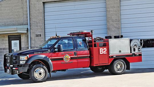 Fire truck stranded on railroad tracks heading to fire