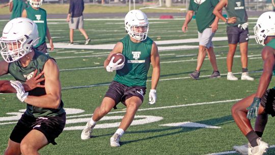 First week of football practice in full swing