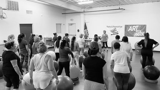 Participants prepare to get fit while drumming on exercise balls during the drum fit class. Photos courtesy of Julie Rydell