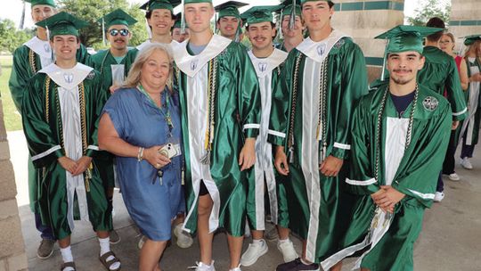 To-be graduates at Taylor High School take a walk aound Naomi Pasemann Elementary School last week. Photo courtesy of the Taylor ISD Facebook page