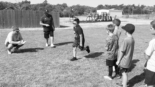 Lions youth football players run an agility drill on July 25 during the first day of the annual football camp held in Granger. Photos courtesy Granger ISD