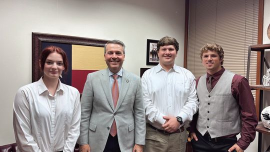 (From left) Students Alex Harwell, House Chair Representative Brad Buckley, Cody Klaus and Nate Tucker. Photos courtesy Granger Independent School District