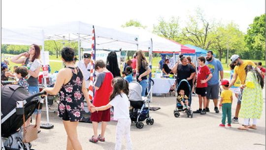 Families visited booths and played games in the park during the community picnic. Photos by Edie Zuvanich