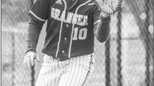 Lions’ senior first baseman Tripp Wilkie catching the ball to secure an out at first base. Photo by Larry Pelchat