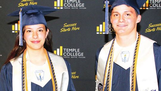 Savannah Coy and Ryan Abbott, Legacy Early College High School’s respective valedictorian and salutatorian of 2022, get ready on the morning of their graduation in Taylor May 20. Courtesy photos