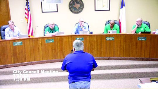 At the July 27 Taylor City Council meeting, Jose Orta, chair of the council compensation committee, answers questions from council members about the committee’s recommendation. Screen shot from Taylor City Council meeting