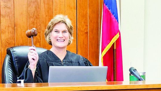 HERE COMES THE JUDGE