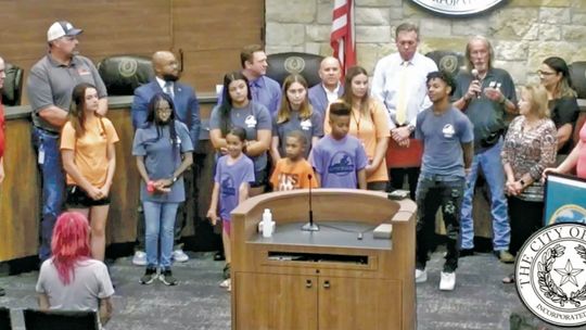 Members of the Parks and Recreation Advisory Board, summer camp staff and summer camp attendees joined City Council in recognizing July as Parks and Recreation Month. Photo courtesy of City of Hutto