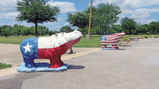 American and Texan hippos at the entrance to Fritz Park, 400 Park Street, are two of the dozens of hippos listed on the city’s map. Photo by Edie Zuvanich.