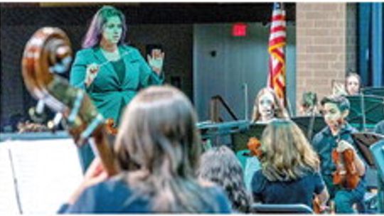 Orchestra teacher Franchesca Mejia conducts the concert orchestra class in a selection at the winter concert. Photos courtesy of the Hutto ISD Facebook page