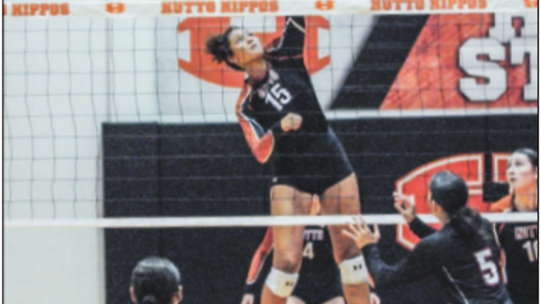 Hutto High School varsity volleyball senior Charlize Williams goes up for a powerful kill during the Lady Hippos’ 2023 season.