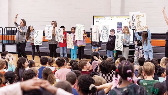 Students celebrate the announcement of Howard Norman Elementary School’s Lighthouse certification. Courtesy photo