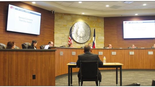 Interim City Manager Isaac Turner sits at his station in front of the Hutto City Council during their meeting at Hutto City Hall May 19. Photo by Fernando Castro